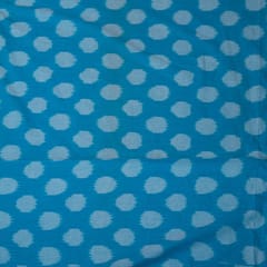 White base with sky blue dot cotton ikat fabric