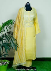 Yellow Muslin Emnroidered Suit With Cotton Bottom And Muslin Scallop Dupatta