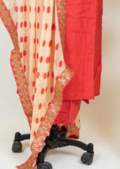 Carrot Color Dola Silk Embroidered Shirt With Shantoon Lower and Cream Color Tabby Print Dupatta With Embroidered Border