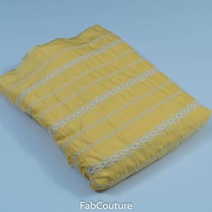 Yellow Color Muslin Embroidered Fabric